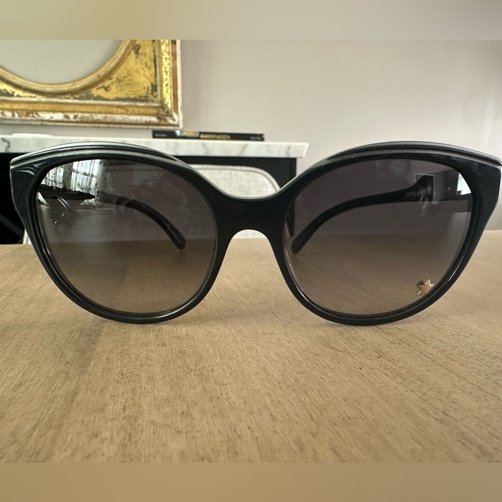 Like new Chloe cat eye sunglasses with star stud on grey gradient lenses.